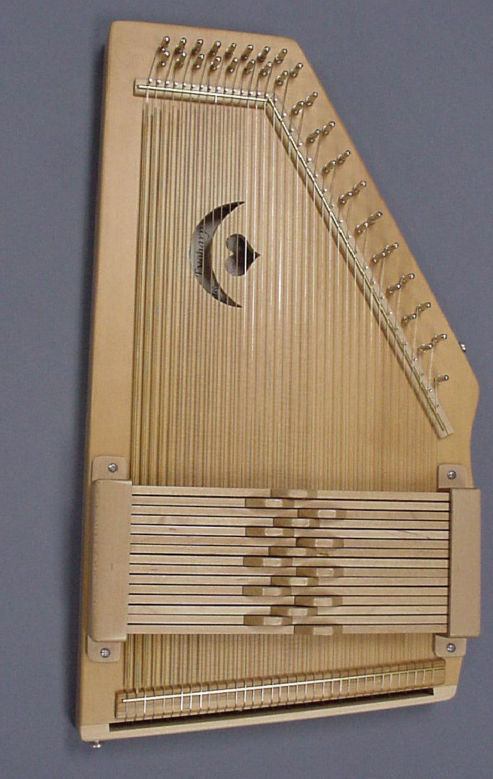 The Evoharp Autoharp - 21 Bar w/Case, a wooden harp known for its tuning options, is showcased on a sleek gray background. This exceptional product offers versatility and elegance to all harp enthusiasts.