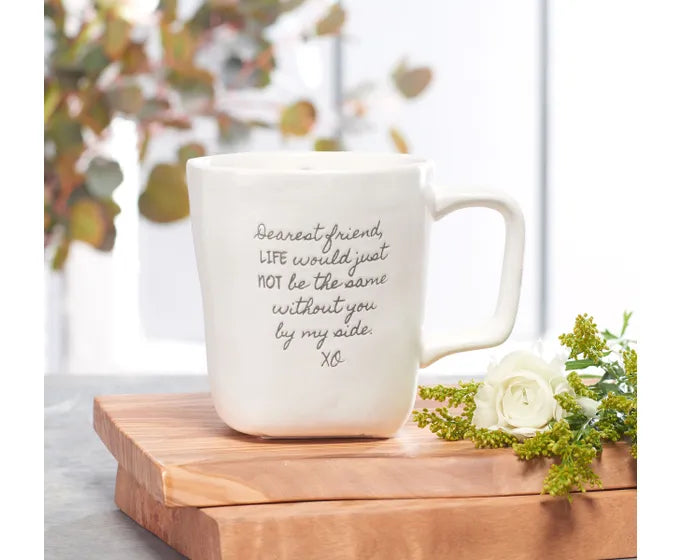 A handmade ceramic Studio M coffee mug with a quote on it from the Heart Notes collection.