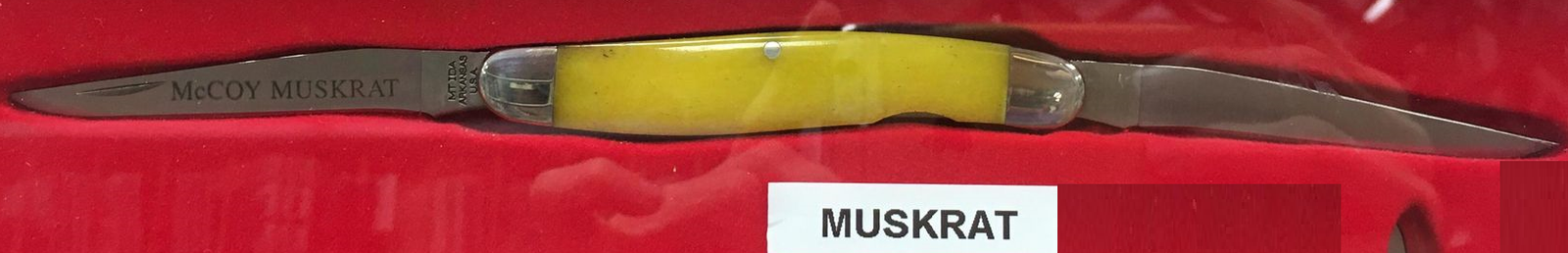 A pair of smooth yellow McCoy Muskrat goggles.