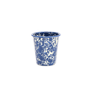 The Splatter Enamelware 10 oz Short Tumbler features a blue and white splatter pattern and is perfect for stylishly serving drinks. Shown on a plain white background, it's a unique addition to your tumbler collection.