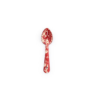A Splatter Enamelware Small Spoon, featuring a red and white speckled design, is centered on a plain white background, adding a vibrant touch of serveware that's perfect for entertaining.