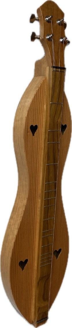 A wooden stringed musical instrument with heart-shaped sound holes, resembling a 4 String Ginger dulcimer, Flathead Hourglass with Cherry back and sides and Redwood top (4FGCR), is standing upright.