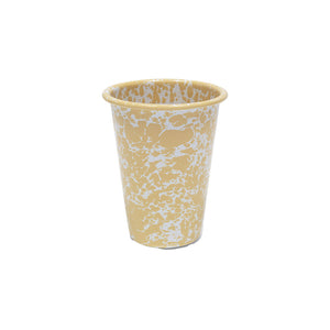 The Splatter Enamelware 14 oz Tumbler, featuring a vibrant yellow color with a white splatter pattern, is shown standing upright against a plain white background.