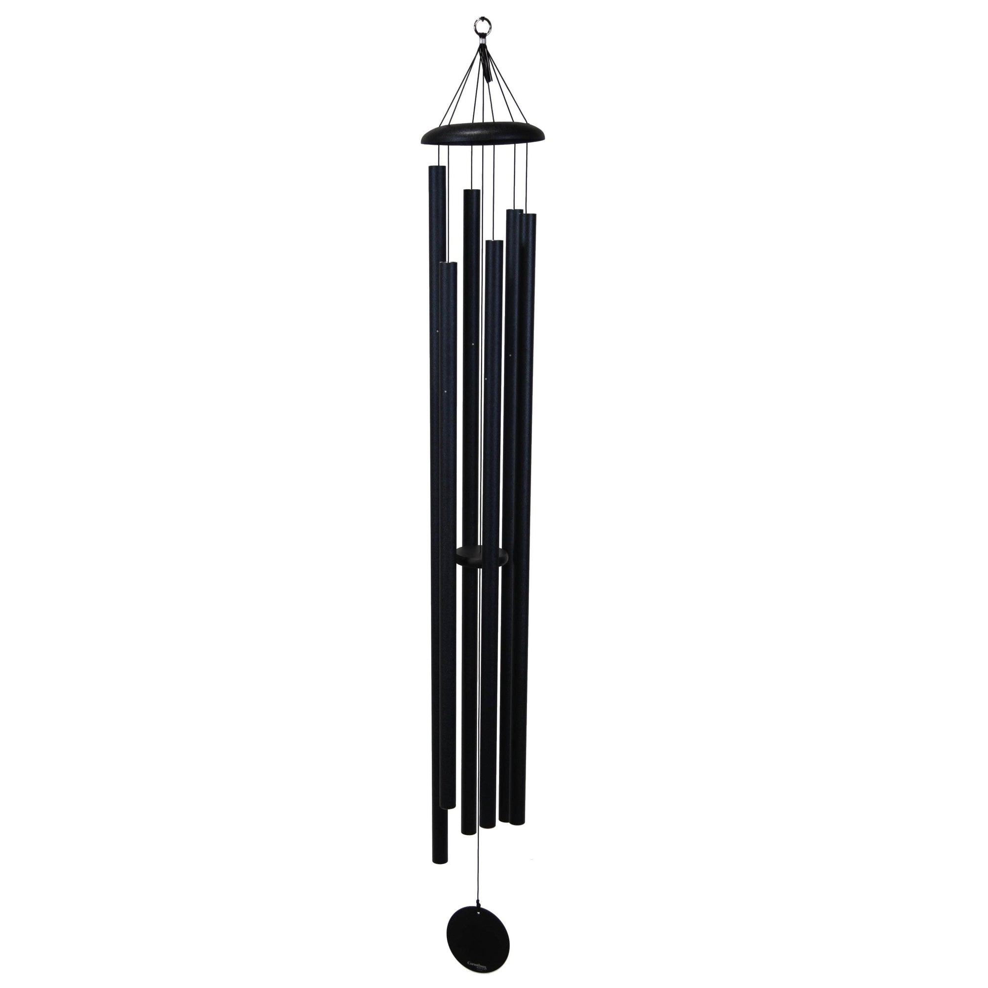 A Corinthian Bells® 74-inch wind chime hanging in a peaceful backyard retreat.