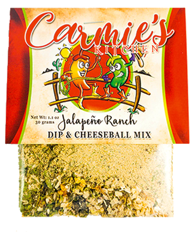 A 1.1oz package of Carmie's Kitchen Jalapeno Ranch Dip Mix, featuring fun cartoon pepper characters on the packaging, is perfect for adding a playful touch to your dip mixes. Enjoy the bold flavors and spicy green chiles in every bite!