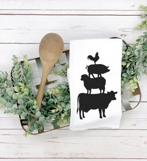 The Animal Stack Tea Towel, with silhouettes of cows and chickens, is perfect for a farmhouse-style kitchen.