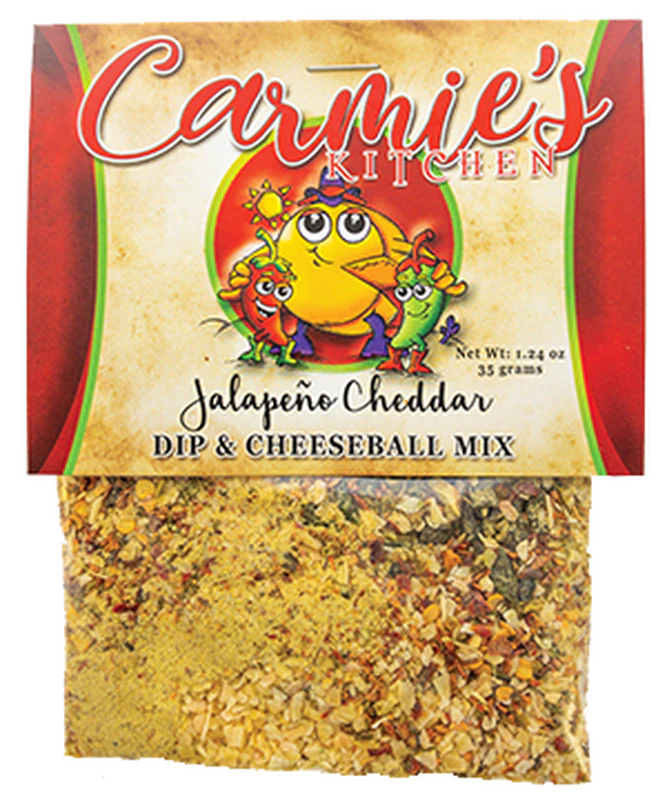 A delightful holiday gift, the clear package of Jalapeno Cheddar Dip Mix, 1.24 oz, features a charming cartoon chili pepper and cheese character on the label, blending jalapenos and chiles for a flavorful experience.