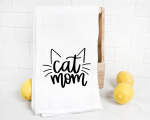 A Cat Mom Tea Towel featuring lemons, perfect as a gift for a cat mom.