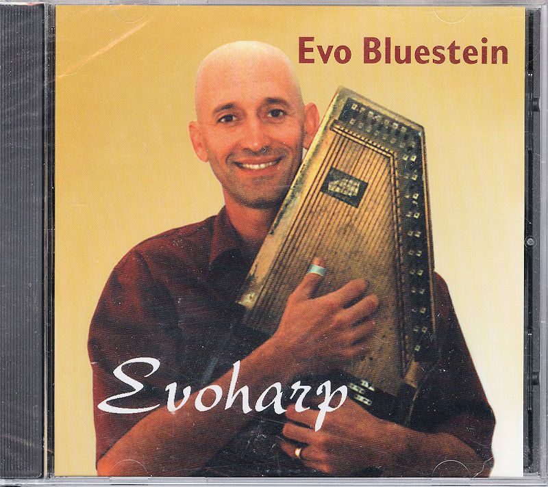 Autoharp CD cover product featuring a person holding an instrument, titled "Evoharp by Evo Bluestein.