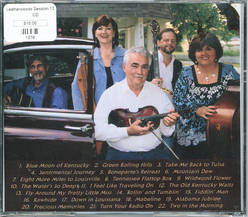 The Leatherwoods Session #12 CD Cover features a captivating group of people posed in front of a car, exuding their undeniable charm and style.