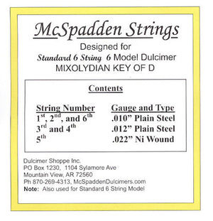 Yellow-bordered label for the 6 String Standard Mixolydian String Set BALL End by McSpadden Strings, designed for a 6-string dulcimer in D, includes string gauges and types, such as plain steel and Ni wound with ball ends. Contact info is at the bottom.