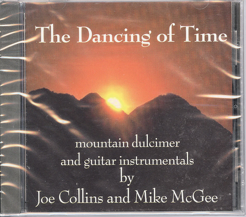 CD cover showcasing an orange sunset behind mountains. Text reads: "The Dancing Of Time by Joe Collins and Mike McGee, featuring guitar instrumentals and mountain dulcimer melodies.