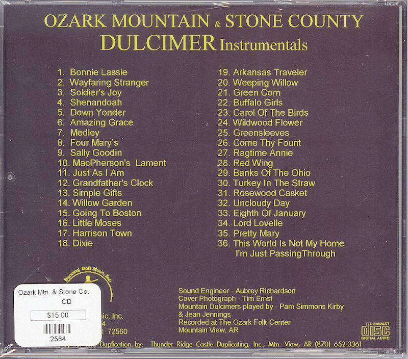 The back cover of a CD case titled "Ozark Mountain and Stone County - by Dancing Doll (Simmons Family)," listing 31 traditional tunes alongside production credits, contact information, and a price sticker indicating $15.00.