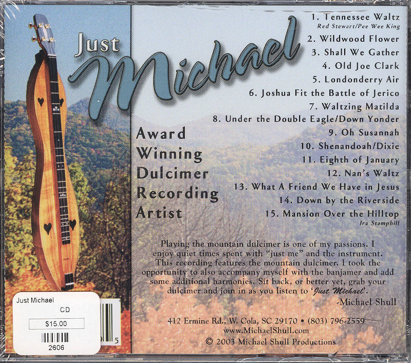 CD cover for "Just Michael" by Michael Shull, featuring 15 instrumental tracks. The design includes a price tag and contact information at the bottom. In the background, there's a scenic landscape with trees and hills, complemented by the charm of a mountain dulcimer.