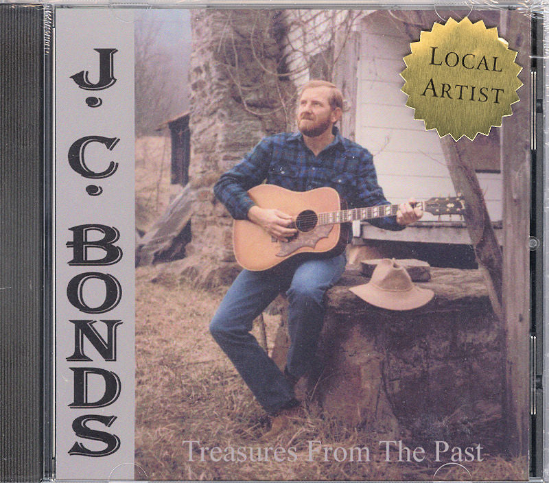 Album cover for "Treasures From the Past" by JC Bonds showcasing a man playing guitar outdoors with a "Local Artist" label.