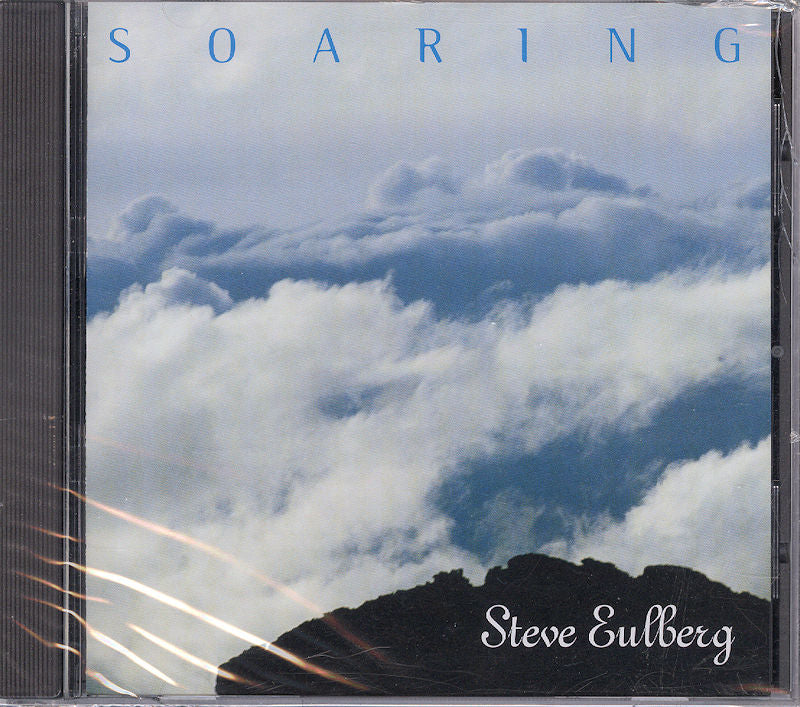 CD cover featuring clouds above a mountain peak with the product name "Soaring by Steve Eulberg".
