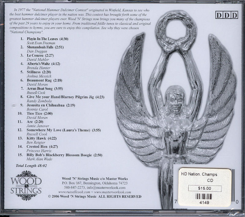 CD back cover featuring a sculpted angel holding a ring. This album, titled "Hammered Dulcimer Champions" by Various Artists, includes 18 tracks and is priced at $15. Released by Wood 'N' Strings Music, this music compilation has a total length of 48:02.