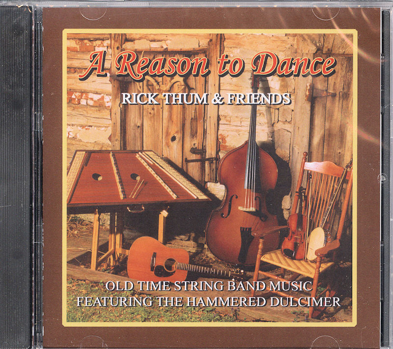 CD cover titled "Monday Night Waltz" by Rick Thum, featuring a hammered dulcimer, guitar, and chair against a wooden wall.