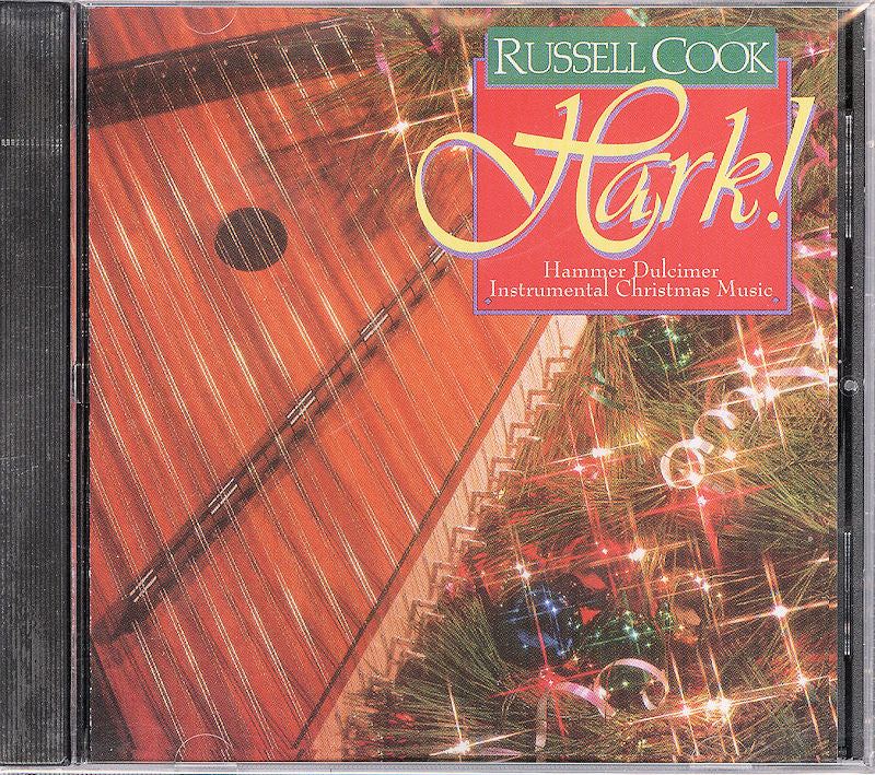 CD cover of "Hark!" by Russell Cook, showcasing instrumental Christmas music played on the hammer dulcimer. The cover features a close-up of a dulcimer along with festive decorations.