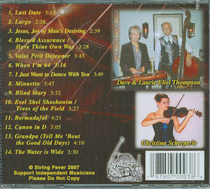The back of a White Christmas - by Russell Cook CD featuring an image of a man and a woman.
