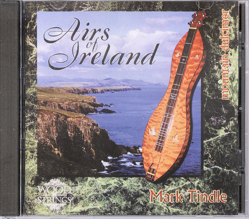CD cover showcasing a mountain dulcimer against a scenic coastal backdrop, titled "Airs of Ireland" by Mark Tindle.