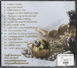 A CD cover featuring An Old Fashioned Christmas - by Linda Brockinton with traditional Christmas tunes.