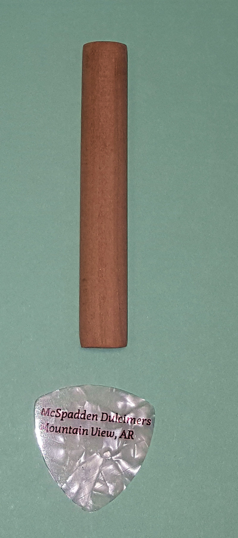 A Pick and Noter with a label on it.