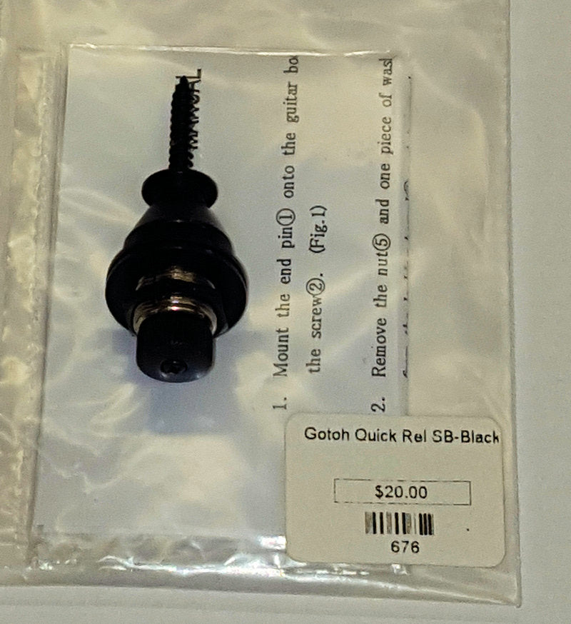 A black screw with a Gotoh Quick Release Strap Button - Black packaged alongside a black handle.
