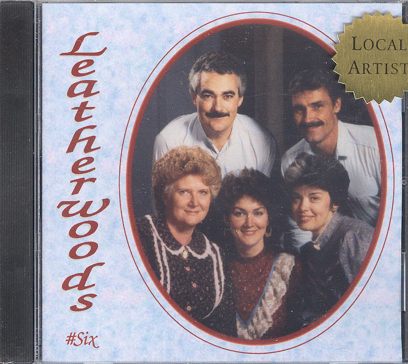 CD cover depicting a formal group photo of three men and two women, titled "Leatherwoods #6," with a badge in the top right that reads "Local Artist." Immerse yourself in local music at its finest with this exclusive release.