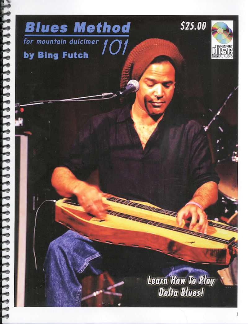 A man strums a mountain dulcimer as the text reads, "Blues Method for Mountain Dulcimer 101 by Bing Futch," priced at $25.00. Immerse yourself in blues music theory with this comprehensive guide and enjoy the included digital album.