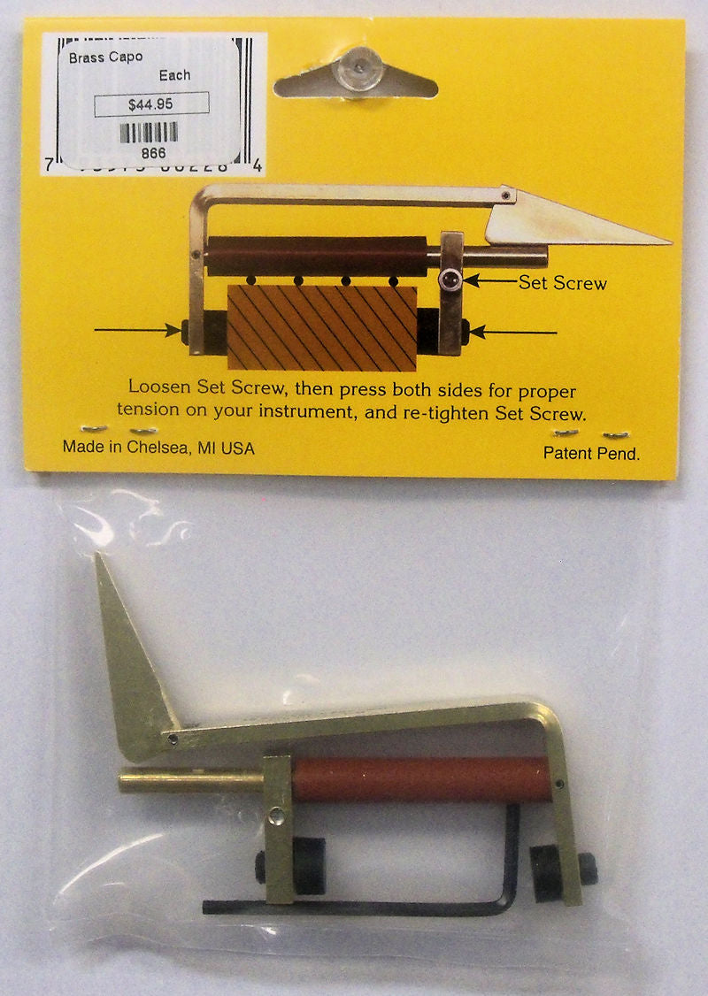 A WALWORTH Mountain Dulcimer Capo SOLD OUT construction toy knife in a package.
